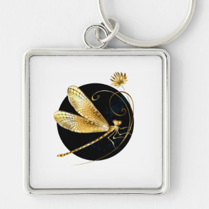 Golden dragonfly in black circle key ring