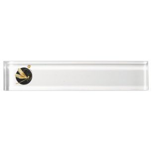 Golden dragonfly in black circle nameplate