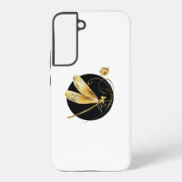 Golden dragonfly in black circle