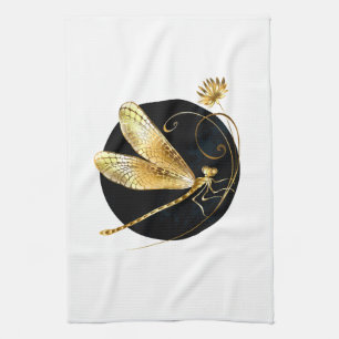 Golden dragonfly in black circle tea towel