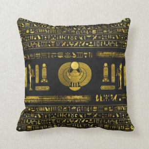 Golden Egyptian Scarab  on black leather Cushion