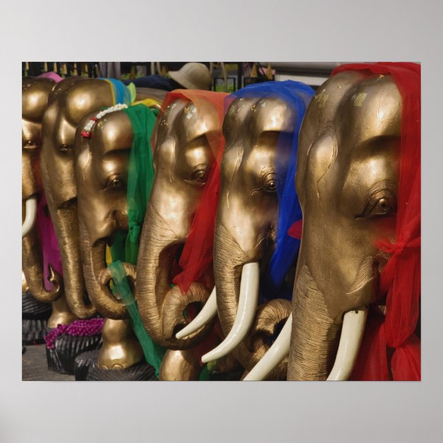 Golden elephants decorated with colourful poster (Front)