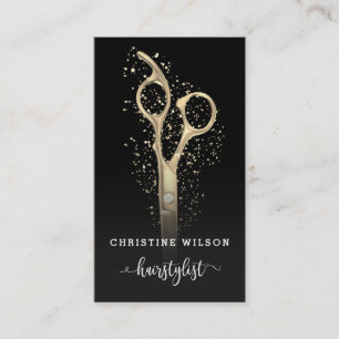 golden hairdresser scissors on black business card