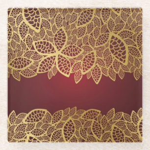Golden leaf lace on red background glass coaster