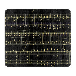Golden Music on Black Cutting Board