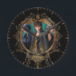 Golden Newt, Tina, and Leta Art Deco Portrait Round Clock<br><div class="desc">FANTASTIC BEASTS: THE CRIMES OF GRINDELWALD™ | Check out this art nouveau portrait featuring PORPENTINA GOLDSTEIN™,  NEWT SCAMANDER™,  and Leta Lestrange within an ornate circular frame. Get this beautiful graphic on your favourite Zazzle product today!</div>