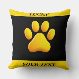 Golden Paw Print Against Black Background Cushion