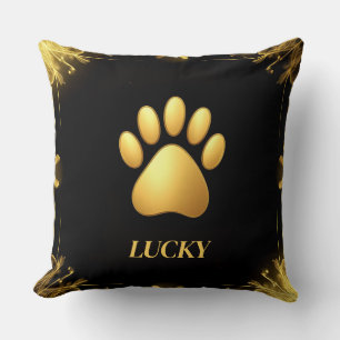 Golden Paw Print Against Black Background Cushion