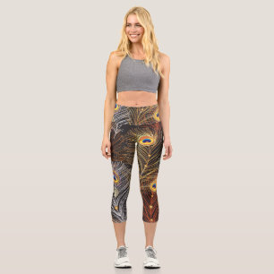 Golden peacock feathers: dark pattern. capri leggings