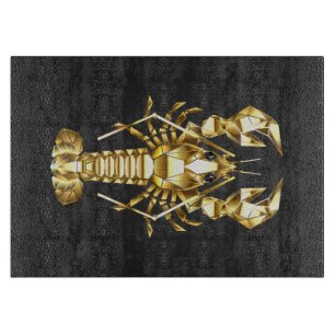 Golden polygonal lobster crawfish on black cutting board
