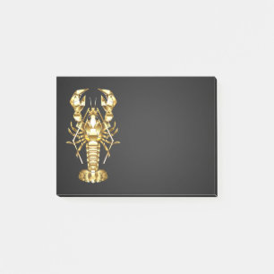 Golden polygonal lobster crawfish on black post-it notes