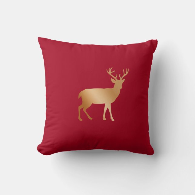 Golden reindeer silhouette on burgundy red cushion (Front)