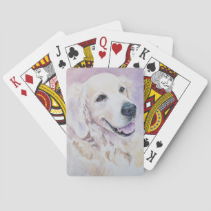 Golden retriever playing cards