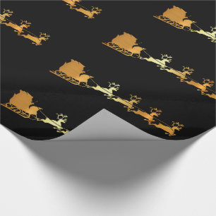 Golden Santa on black X-mas wrapping paper