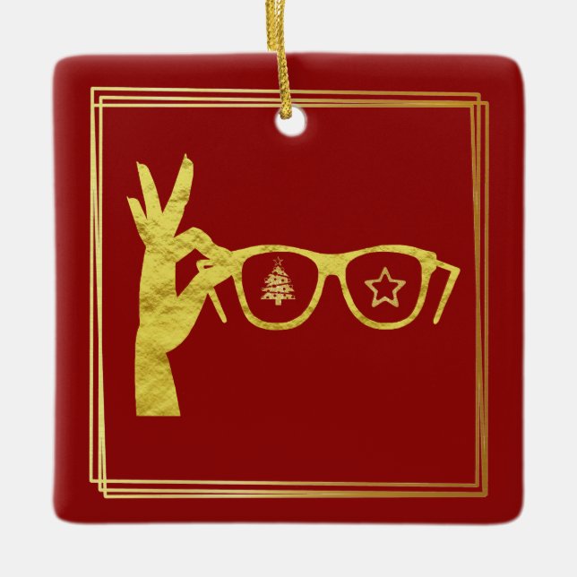 Golden Silhouette Hand Holding Glasses Ornament (Front)