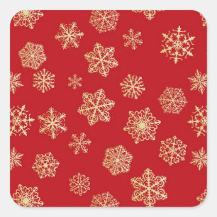 Golden snowflakes against deep red square sticker