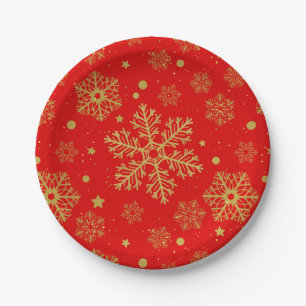 Golden snowflakes on red paper plate