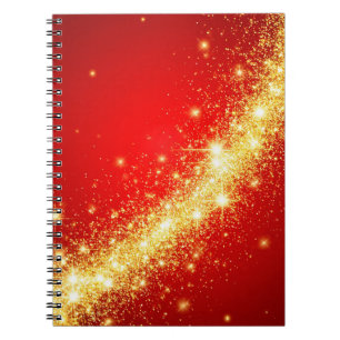 Golden Sparkling Trail on Vibrant Red Background Notebook