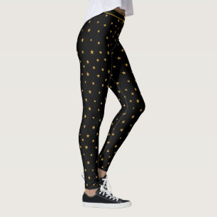 Golden stars on black leggings