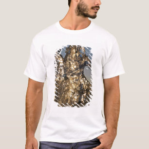 Golden sunrise seen through iceberg formation T-Shirt