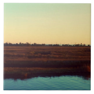Golden Sunset over Water and Marshland Photo Tile