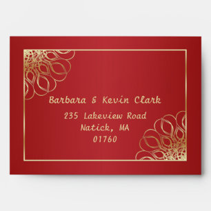 Golden swirls on red gradient envelopes
