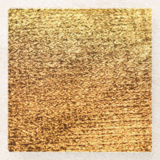 Golden textile: glamourous macro background. glass coaster