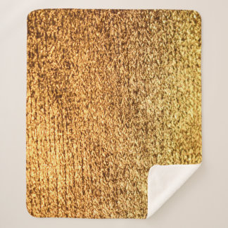Golden textile: glamourous macro background. sherpa blanket