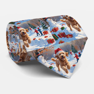 Goldendoodle Running in Snow with Christmas Hat Tie
