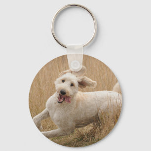 Goldendoodle Runs Through Grass Key Ring