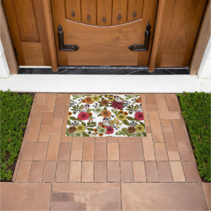 Goldfinches in the garden doormat