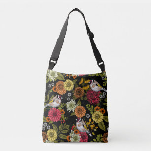 Goldfinches in the garden on black crossbody bag