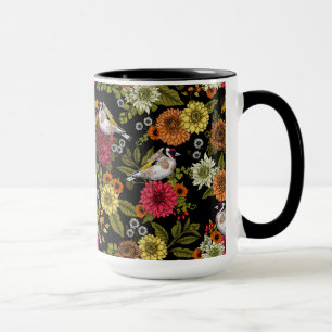 Goldfinches in the garden on black mug