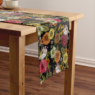 Goldfinches in the garden on black short table runner