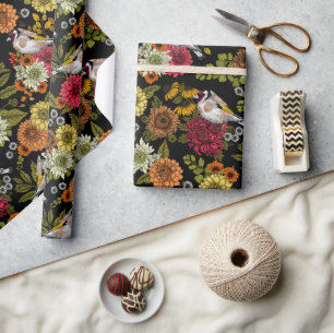 Goldfinches in the garden on black wrapping paper
