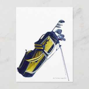 Golf bag with clubs on white background postcard