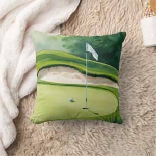 Golf ball and flag on putting green cushion