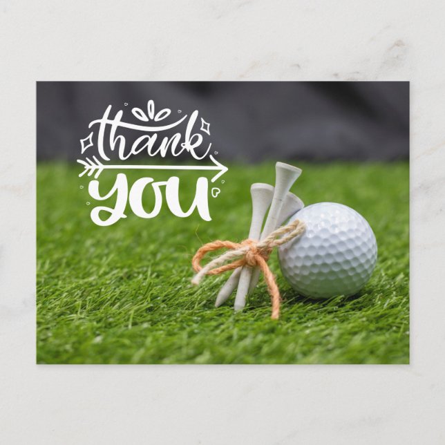 Golf ball and tee are on green grass thank you  postcard (Front)