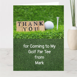 Golf  ball and tee on green grass  thank you card