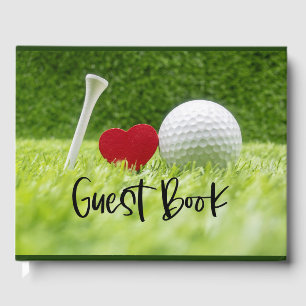 Golf ball and tee on green grass with love  guest book