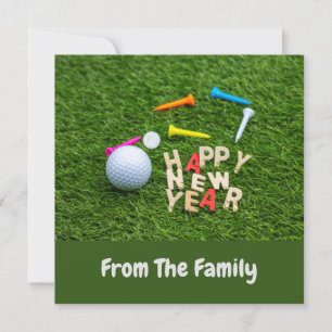 Golf ball and tee with Happy New Year on green