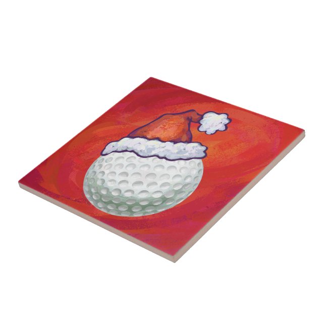 Golf Ball in Santa Hat on Red Tile (Side)