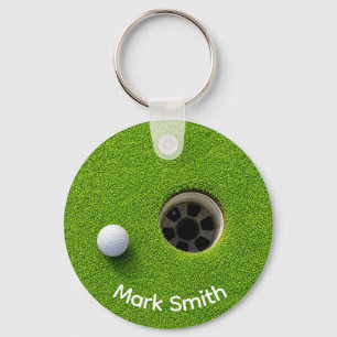 Golf Ball Next to Hole on Green Grass Golf Course Key Ring