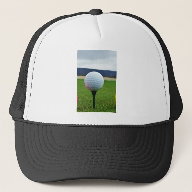 Golf Ball on a mountain golf course Trucker Hat (Front)