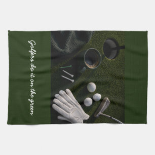 Golf ball on putting green tea towel