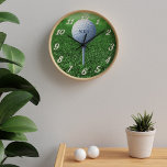 Golf Ball On Tee Green Monogrammed Golfer Clock<br><div class="desc">If you're looking at the clock wondering when the time is for you to tee off, what about this golf ball on a tee wall clock? Suitable to tell the time when you can drive to the fairway for a round of golf. Great gift for golfers and for dads that...</div>