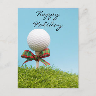 Golf ball with Christmas ribbon is on tee Holiday Postcard