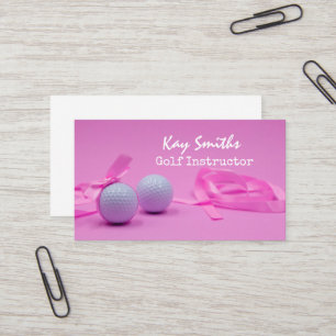 Golf ball with pink ribbon on pink woman golfer business card