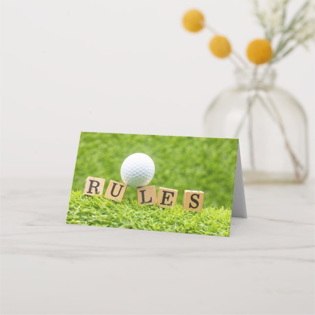 Golf Ball  with RULES on green grass Place Card (Front)