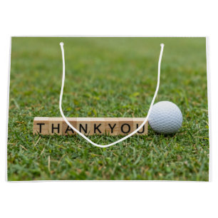 Golf ball with text Thank you on green grass Large Gift Bag